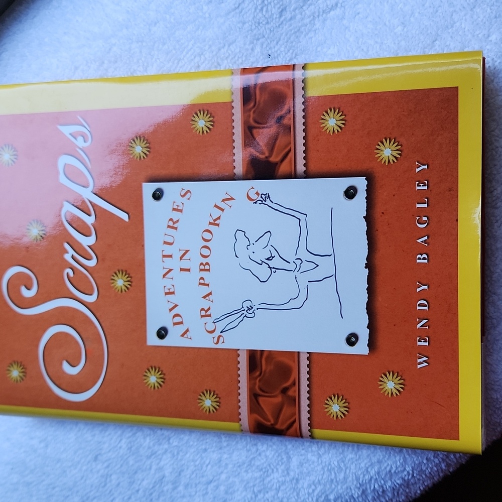 NEW.  BOOK "SCRAPS. ADVENTURES IN SCRAPBOOKING" BY WENDY BAGLEY.
